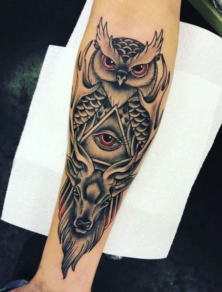 Neo-traditional owl, eye and stag forearm tattoo